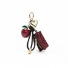 Otrera Women's Bag Charm Red In Metallic