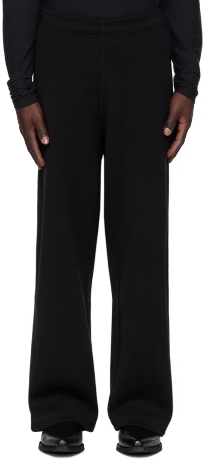Our Legacy Reduced Straight-leg Crinked Cotton-blend Trousers In Black Pseudo Knit