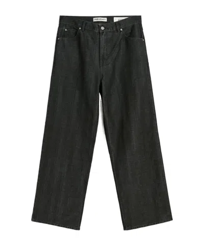 Our Legacy Coated Herringbone Jeans In Black