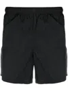 Our Legacy Elastic Waistband Swim Shorts With Side Pockets In Black