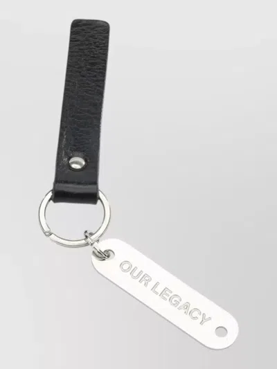 Our Legacy Leather Keychain Featuring Metallic Tag Strap In Black