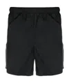 Our Legacy Elastic Waistband Swim Shorts With Side Pockets In Black