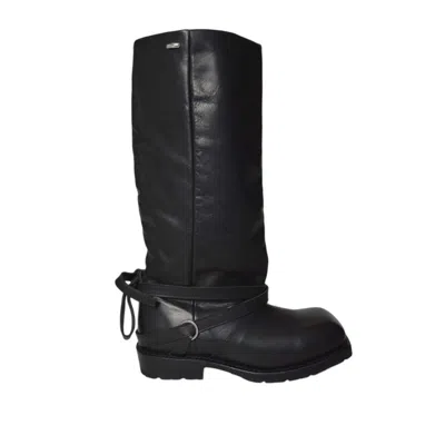 OUR LEGACY TALL BLACK LEATHER BOOTS WITH WRAP-AROUND STRAP AND METAL RING DETAIL
