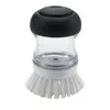 Oxo Soap Dispensing Palm Brush In Black