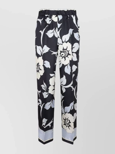 P.A.R.O.S.H WAISTBAND TROUSERS WITH FLORAL PATTERN AND CONTRAST HEM