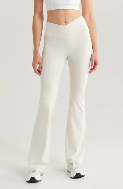 Pacsun Crossover Flare Leg Yoga Pants In White Sand/ivory