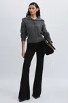 Paige Angled Waist Flared Jeans In Black