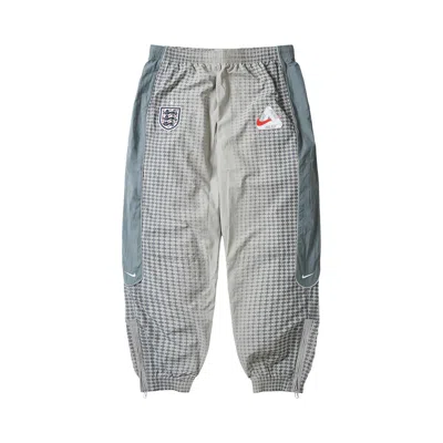 Pre-owned Palace X Nike England Solo Swoosh Track Pants 'pewter Grey/cool Grey/bright Crimson' | Men's Size M