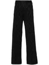 Palm Angels Monogram-jacquard Side Stripe Detailed Trousers In Black