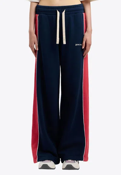 Palm Angels Classic Logo Colorblocked Track Pants In Navy