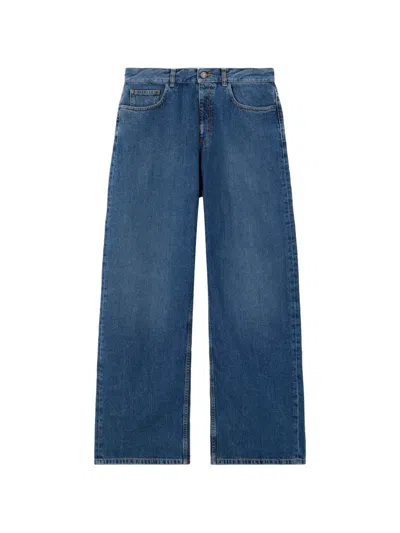 Palm Angels Curved Logo Denim Jeans In Blue