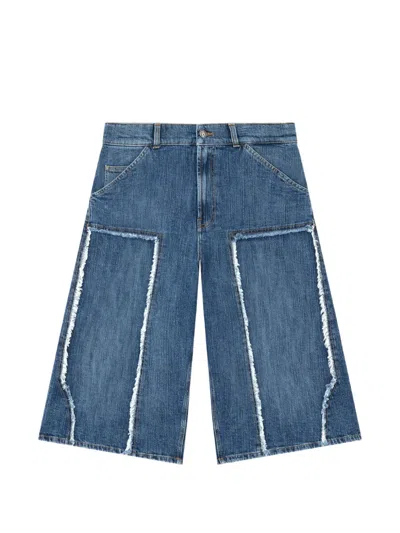 Palm Angels Curved Logo Denim Skater Shorts In Blue