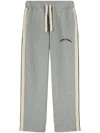 Palm Angels Curved Logo Printed Sweatpants In Grey