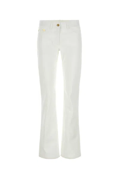 Palm Angels Flared Cotton Jeans In White