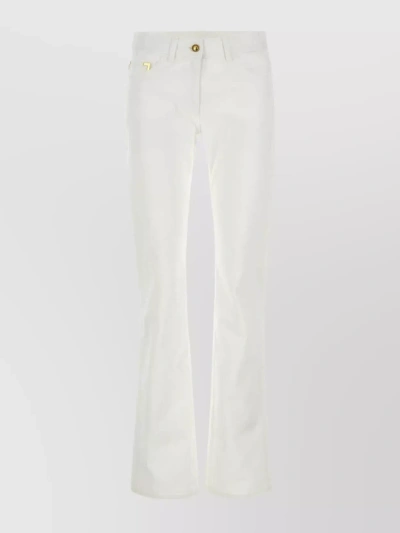 PALM ANGELS FLARED DENIM TROUSERS WITH BELT LOOPS AND BACK POCKETS