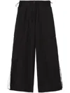 Palm Angels Wide-leg Nylon Parachute Pants With Adjustable Cuffs In Black
