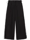 Palm Angels Wide-leg Nylon Parachute Pants With Adjustable Cuffs In Black