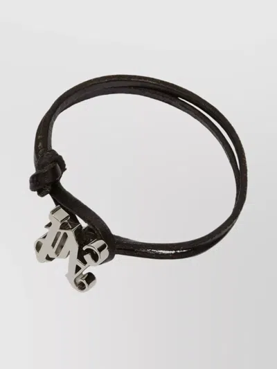 PALM ANGELS LEATHER STRAP METAL CHARM BRACELET