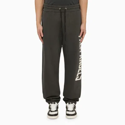 PALM ANGELS JOGGER PANTS WITH OVERSIZED LOGO