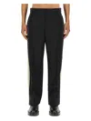 Palm Angels Pants With Logo Band In Black