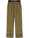 PALM ANGELS MILITARY GREEN PANTS WITH AMEBAS PRINT