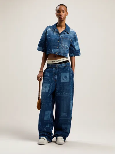 Palm Angels Newsprint Baggy Denim Pants In Blue
