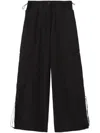 Palm Angels Wide-leg Nylon Parachute Pants With Adjustable Cuffs In Black