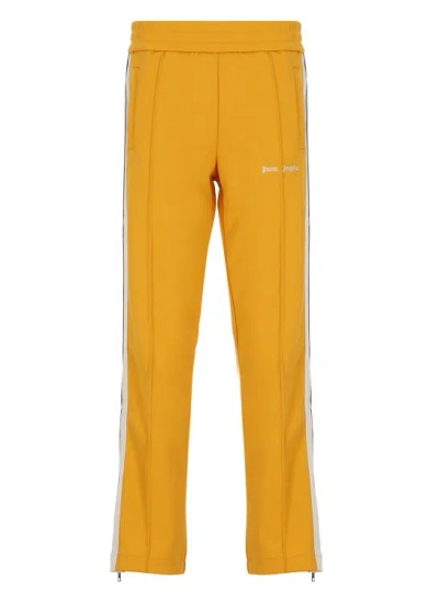 Palm Angels Pants With Logo In Orange