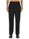Palm Angels Pants With Logo Band In Black