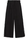 Palm Angels Wide-leg Nylon Parachute Pants With Adjustable Cuffs In Black