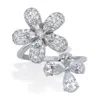 Palm Beach Jewelry 1.67 Cttw Round & Pear Cut Cz Platinum Plated Silver Spinning Daisy Flower Ring