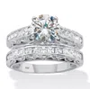 Palm Beach Jewelry 3.08 Ctw. Round-cut Cubic Zirconia Platinum Over Silver 2 Piece Bridal Ring Set
