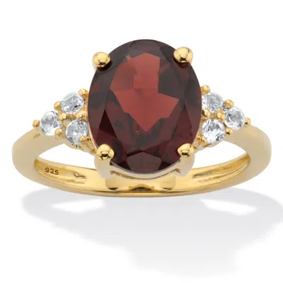 Palm Beach Jewelry 3.99 Cttw. Oval Garnet Ring With White Topaz Accents 14k Gold-plated Silver Ring In Red