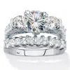 Palm Beach Jewelry 4.69 Tcw Round And Princess-cut Cz Platinum Over Silver 2 Piece Bridal Ring Set