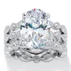 Palm Beach Jewelry 5.81 Tcw Oval-cut Cubic Zirconia Platinum-plated 3-piece Wedding Ring Set