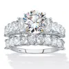 Palm Beach Jewelry 6.28 Cttw. Round And Emerald-cut Cz Platinum Over Silver 2 Piece Bridal Ring Set