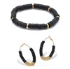 Palm Beach Jewelry Black Disc Beaded Goldtone Hoop Earrings And Stackable Stretch Bracelet Set In Yellow