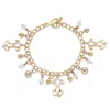 Palm Beach Jewelry Round Crystal Beaded Puppy Dog Charm Goldtone Bracelet 7.5"