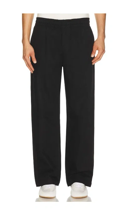 Palmes Lucien Herringbone Trousers In Orange