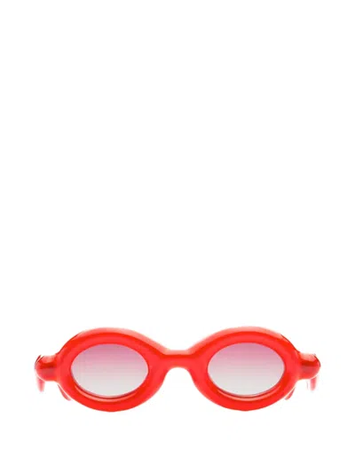 Paloceras Pebble Oval-frame Sunglasses In Red