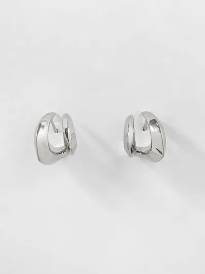 Panconesi Asymmetrical Metal Dangle Earring With Engraved Logo In Metallic