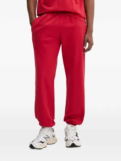 Pangaia Logo-print Cuffed Track Pants In Red