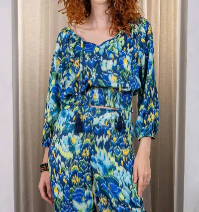 Paparazzi Ikat Print Peasant Top With Shirred Midriff In Blue-green In Multi