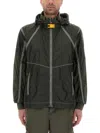 Parajumpers Edge Green Jacket With Logo Patch On The Sleeve And Shoulder Straps On The Back In Tech Fabric Man In Military Green