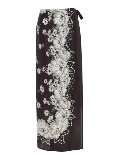 P.A.R.O.S.H WHITE AND BLACK SKIRT WITH SIDE CLOSURE AND ALL-OVER FLORAL PRINTED PATTERN