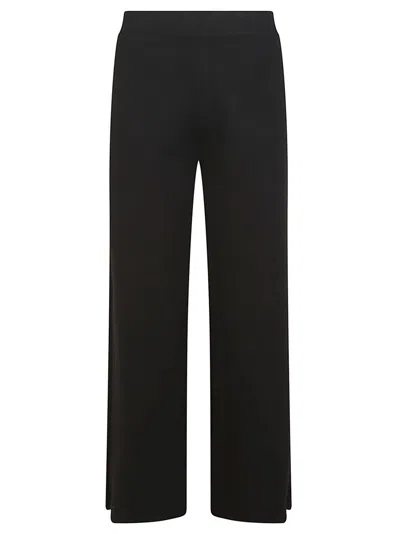 P.a.r.o.s.h . Wool Blend Knit Trousers With Flared Fit And Elastic Waist In Black