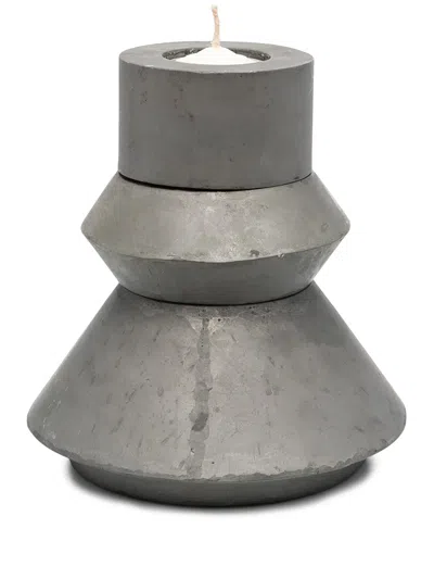 Parts Of Four Modular Candle Totems In Grey