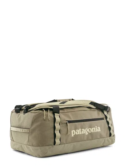 Patagonia Rectangular Black Hole Duffel Bag With Padded Shoulder Straps In Green