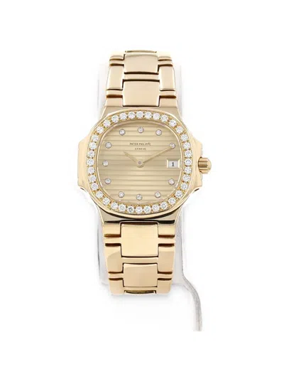 Pre-owned Patek Philippe 1990 Nautilus 27mm Watch In Gold
