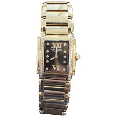 Pre-owned Patek Philippe Twenty~4 Rose Gold Brown Dial In Red